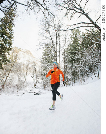 Woman jogging in winter forest 10627236