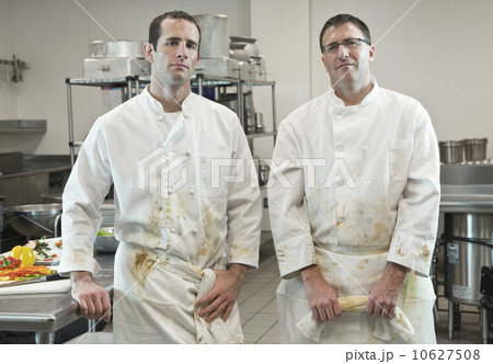 Dirty chefs posing in kitchen 10627508