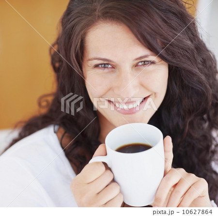 Relaxed woman drinking coffee Relaxed woman drinking coffee 10627864