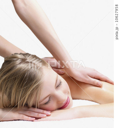 Young woman getting massage Young woman getting massage 10627958