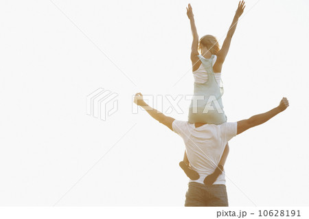 Man carrying woman on his shoulders Man carrying woman on his shoulders 10628191