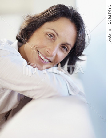 Woman relaxing on couch 10628431