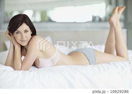 Sexy woman lying on bed Sexy woman lying on bed 10629286