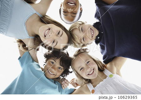 Happy children huddled together 10629365