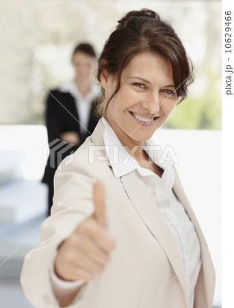 Businesswoman thumbs-up 10629466