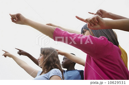 Group of friends pointing Group of friends pointing 10629531