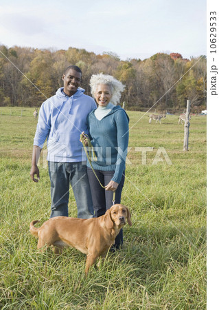 Couple and their dog 10629533