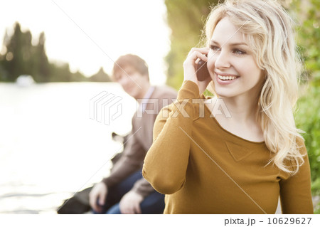 Young woman talking on phone Young woman talking on phone 10629627