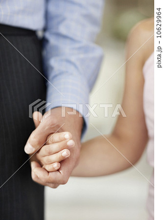 Granddaughter (10-11) and grandfather holding hands Granddaughter (10-11) and grandfather holding hands 10629964