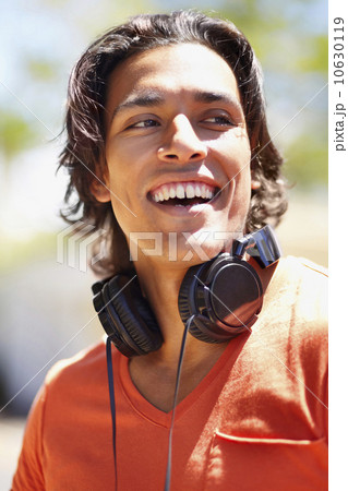 Portrait of young man with headphones Portrait of young man with headphones 10630119
