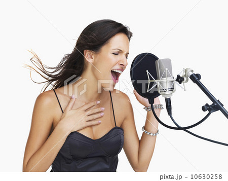 Studio shot of singing rockstar 10630258