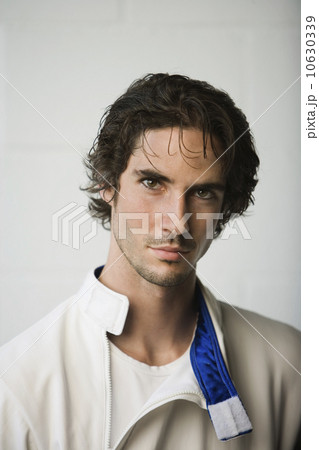 Portrait of man in fencing uniform 10630339