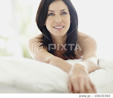 Sexy woman lying on bed 10630360