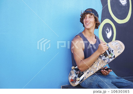Portrait of male skateboarder 10630365