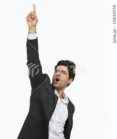 Studio portrait of stylish man cheering 10630556