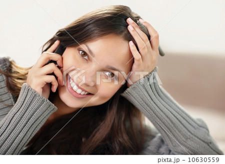 Brunette woman talking on phone 10630559