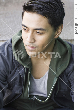 Close up of man looking pensive Close up of man looking pensive 10630564
