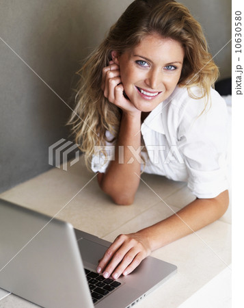 Woman typing on laptop Woman typing on laptop 10630580