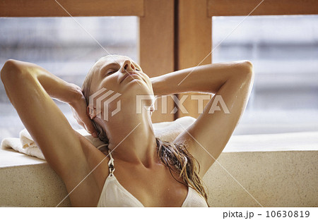 Woman enjoying bath spa Woman enjoying bath spa 10630819