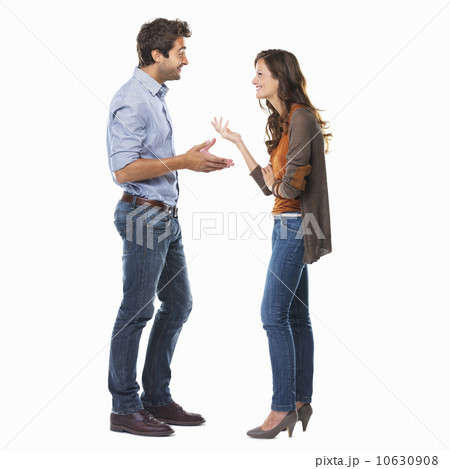 Studio shot of young couple having conversation 10630908