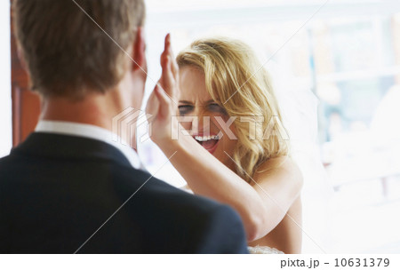 Bride slapping groom Bride slapping groom 10631379