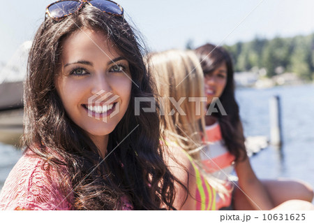Portrait of three young women outdoors 10631625