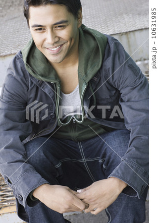 Man sitting on step 10631985