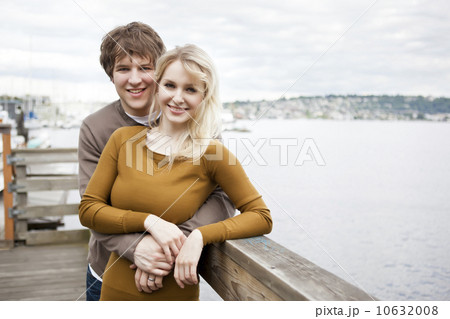 USA, Washington, Seattle, Portrait of young couple on pier USA, Washington, Seattle, Portrait of young couple on pier 10632008