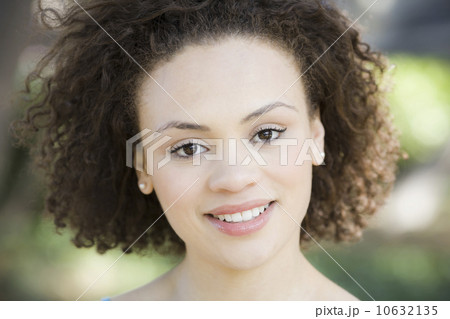 A woman outdoors smiling A woman outdoors smiling 10632135