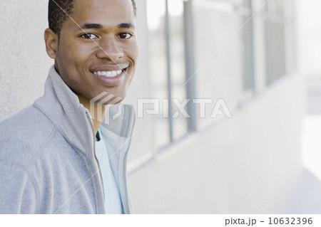 Portrait of young man smiling Portrait of young man smiling 10632396