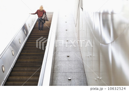 USA, California, Los Angeles, Woman on escalator in subway station 10632524