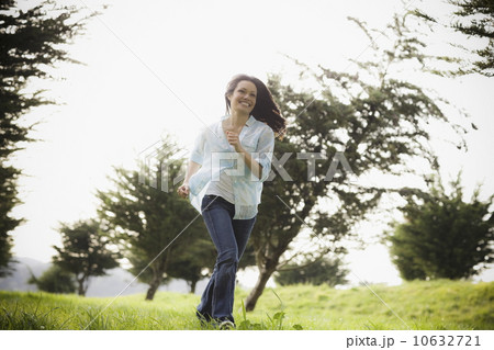Woman walking in park 10632721