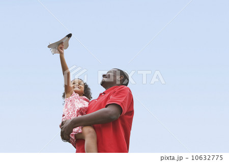 Child playing with toy plane Child playing with toy plane 10632775