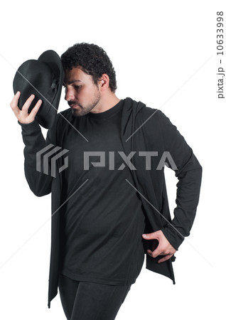 Man in black dancing with hat 10633998