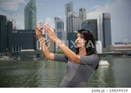 Asian Beauty taking picture or selfie Asian Beauty taking picture or selfie 10634414