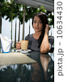 Asian Beauty enjoying coffee 10634430