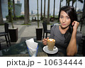 Asian Beauty enjoying coffee 10634444