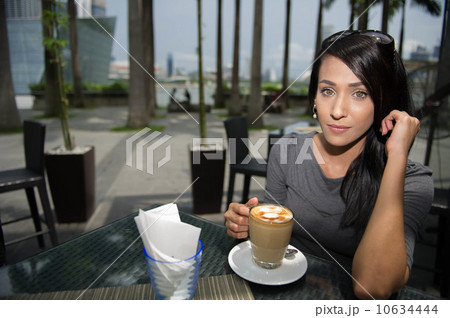Asian Beauty enjoying coffee 10634444
