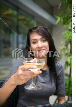 Asian Beauty having wine 10634447