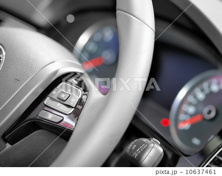 Close up of steering wheel commands 10637461