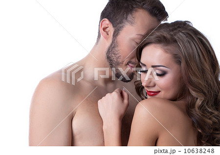Sexy naked girl shyly hiding in arms of lover 10638248