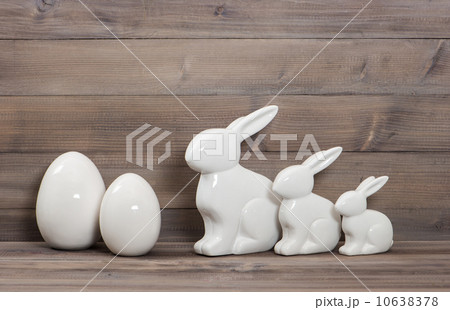 easter bunny family and white ceramic eggs easter bunny family and white ceramic eggs 10638378
