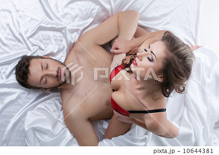 Top view of passionate young lovers having sex Top view of passionate young lovers having sex 10644381