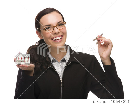 Mixed Race Female Presenting Keys and Holding a Small House 10647011