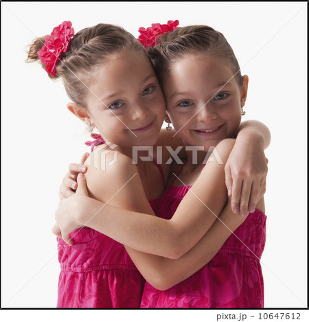 Twins embrace Twins embrace 10647612