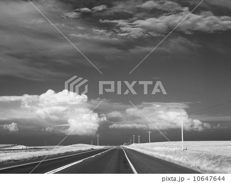 Dark sky over deserted highway 10647644