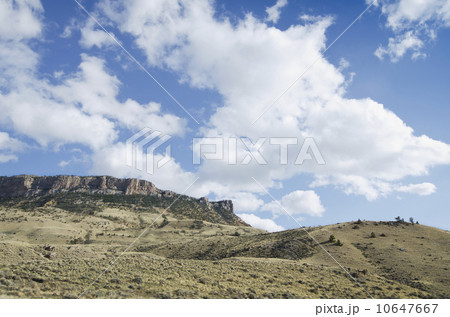 Clouds over barren landscape 10647667