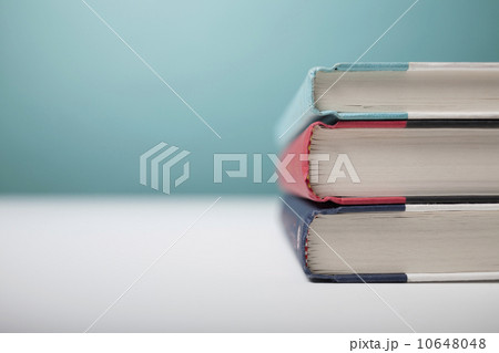 Studio shot of three books in stack 10648048