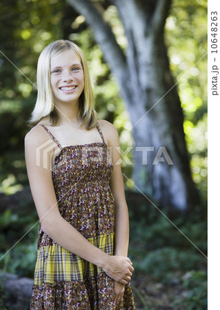 Young girl standing outside Young girl standing outside 10648263