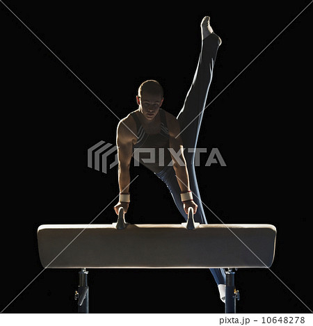 Gymnast on pommel horse 10648278